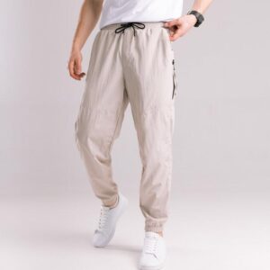 Бежеві чоловічі джогери. Джогери плащівка спорт чоловічі Pobedov Yoxo. Штани джогери з кишенями